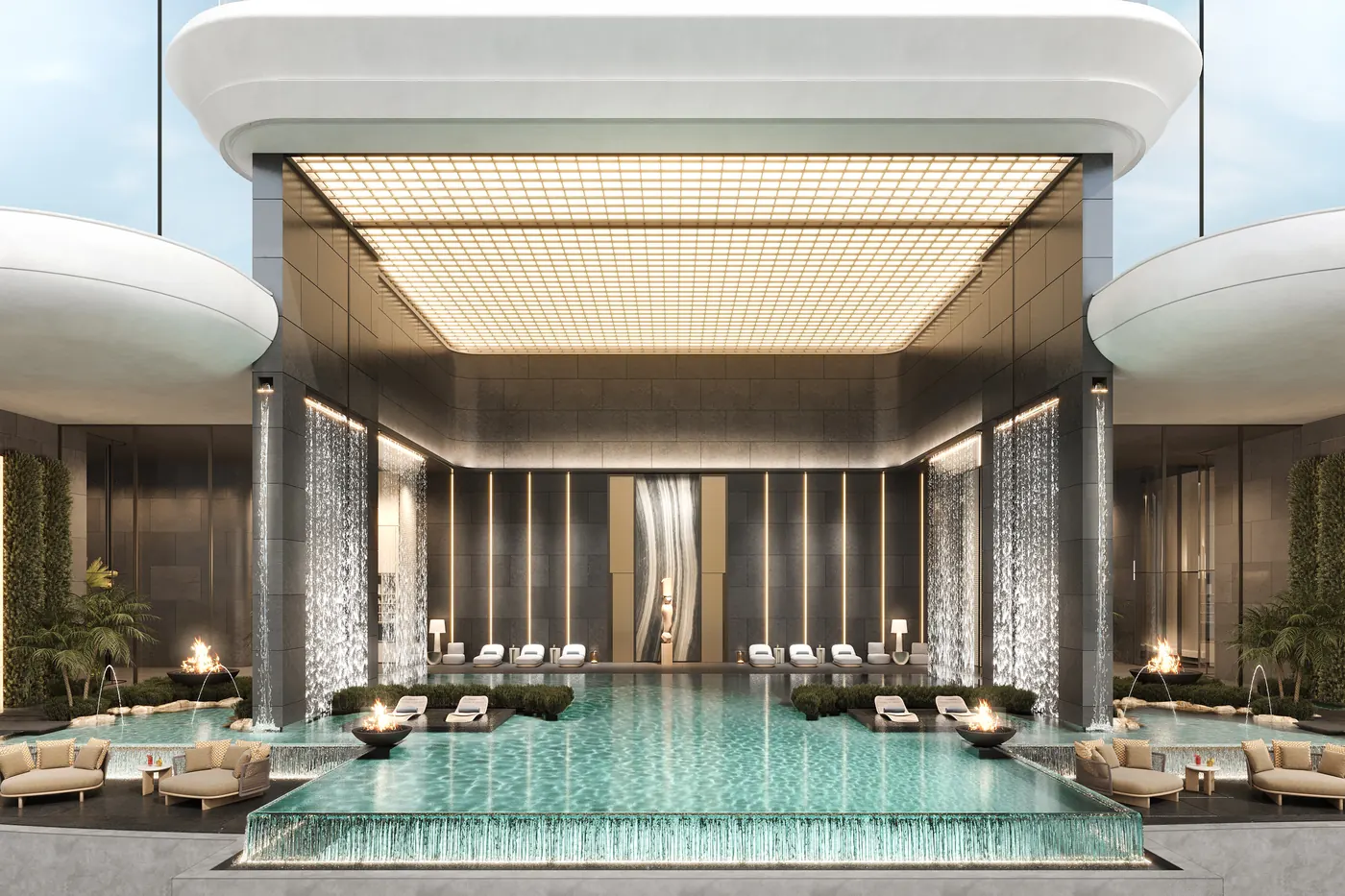 A floor built for recovery: An indoor-outdoor infinity pool under an 8 m ceiling, on the level Amali calls The Retreat.